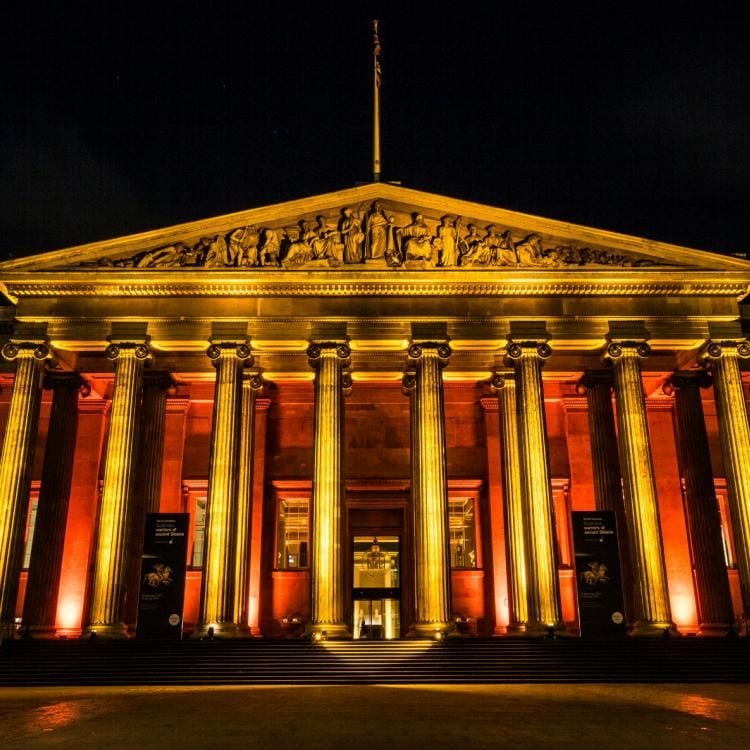 Front of British Museum lit up at night