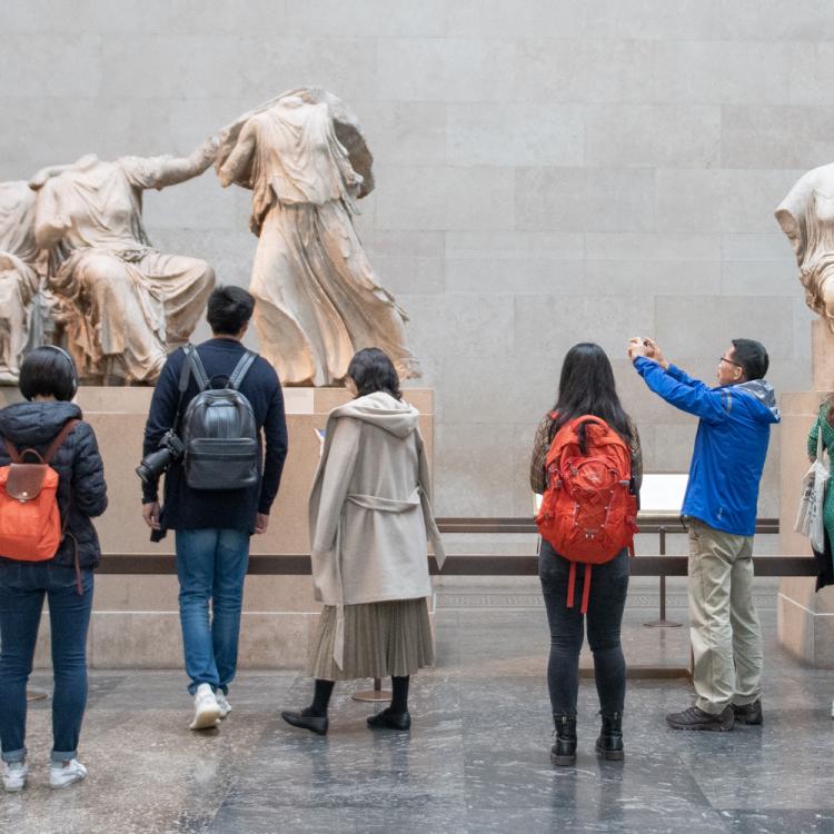 Visitors standing in the Parthenon gallery