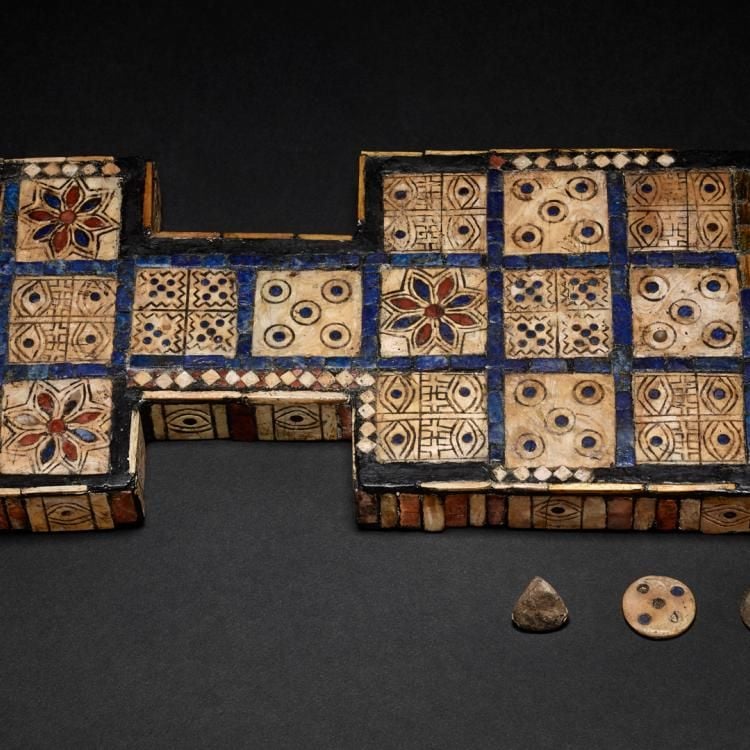 Royal Game of Ur board with a dice and two pieces