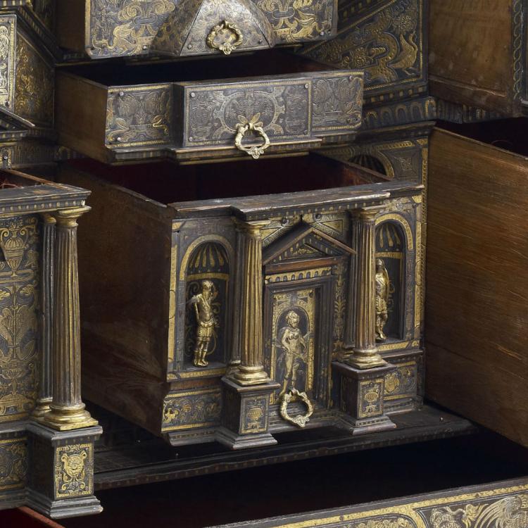 Cabinet drawers formed to represent a classical façade