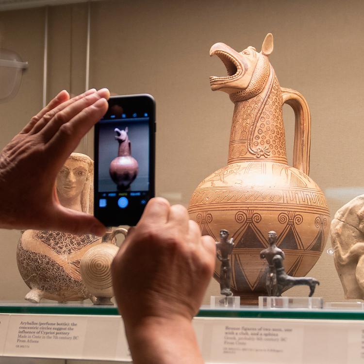 Archaic Cycladic pottery jug with a spout in the form of a griffin's head