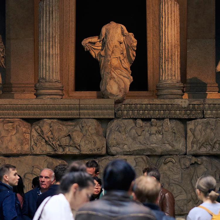 Visitors in room 17 where the Nereid Monument sits