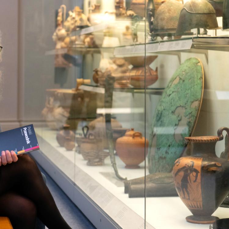 Visitors sitting in front of the display cabinet in Room 71
