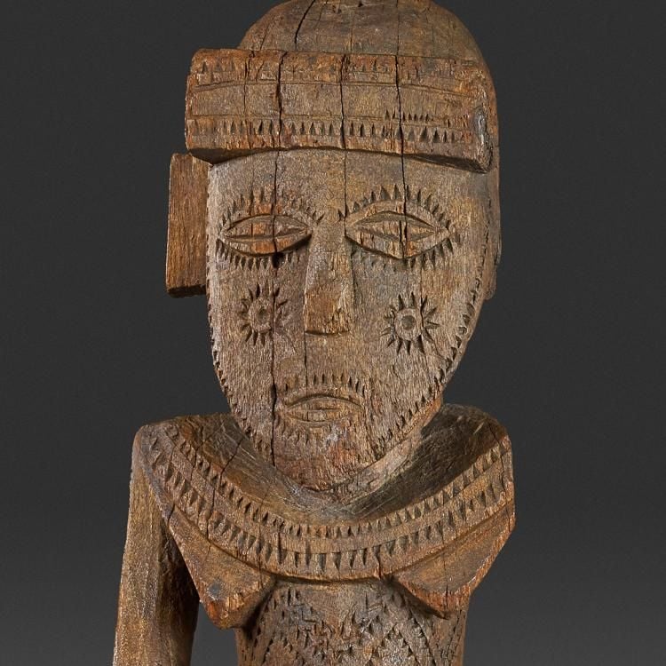 Standing female figure of wood.