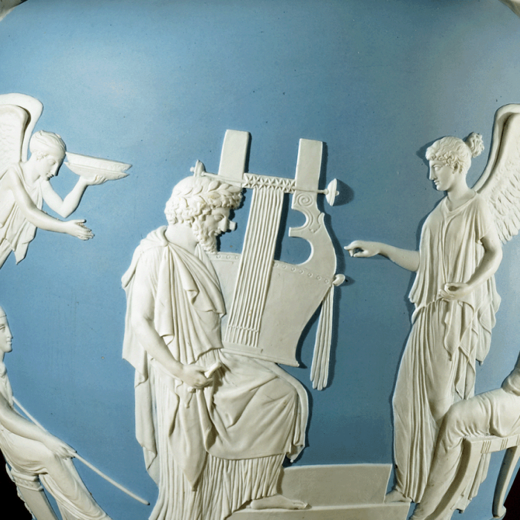 Pale blue jasper ware vase with white applied reliefs depicting a man with a lyre flanked by two angels.