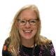 Francesca Hillier wears tortoiseshell glasses and has blonde hair