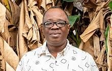 Segun Opadeji with foliage behind