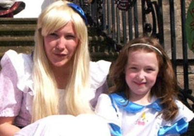 Woman and child in fancy dress costumes