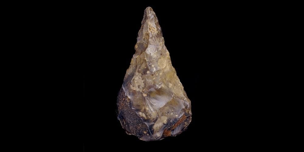 A Palaeolithic handaxe made from flint.