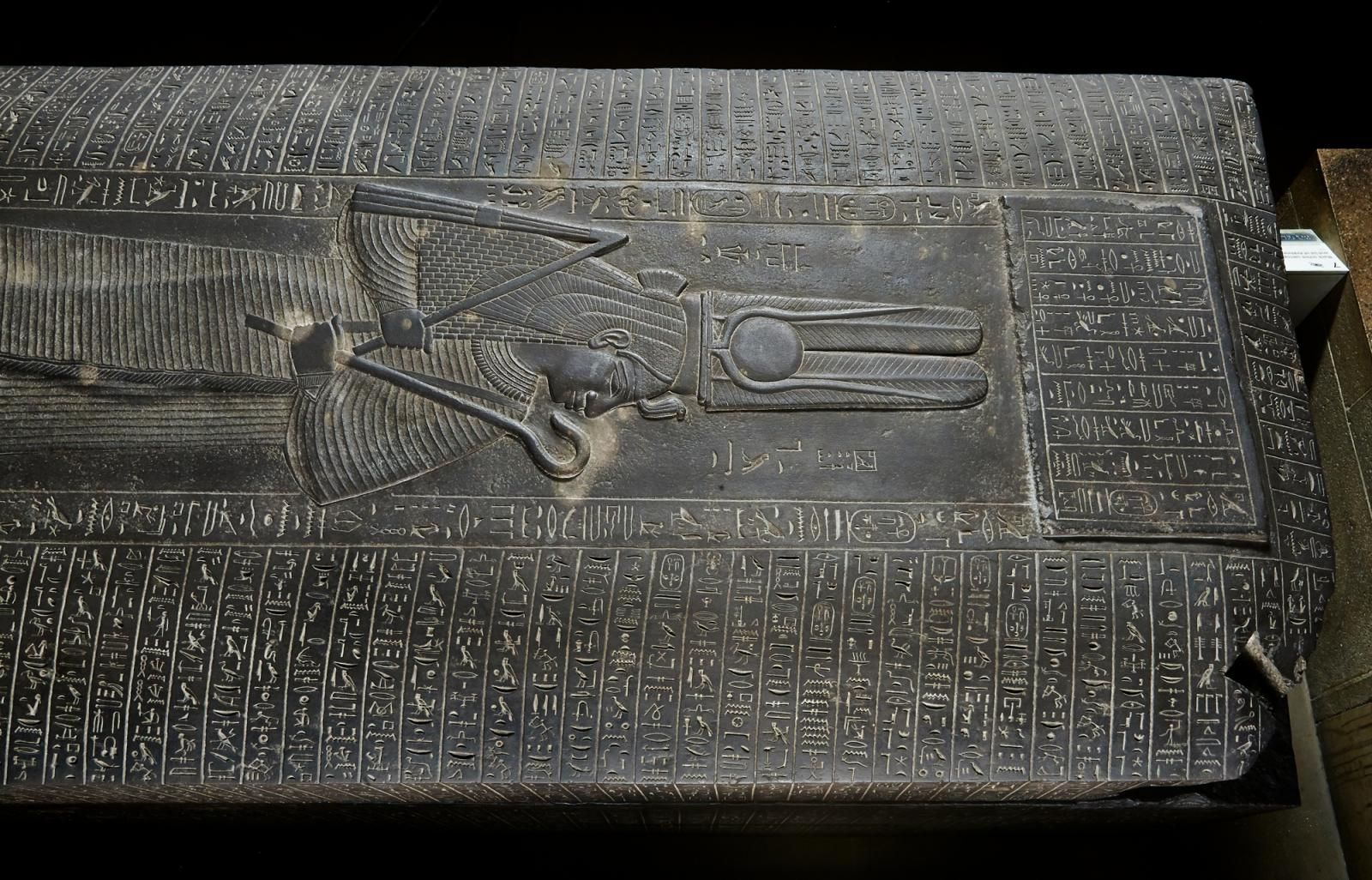 Large sarcophagus with pharaoh upon it.