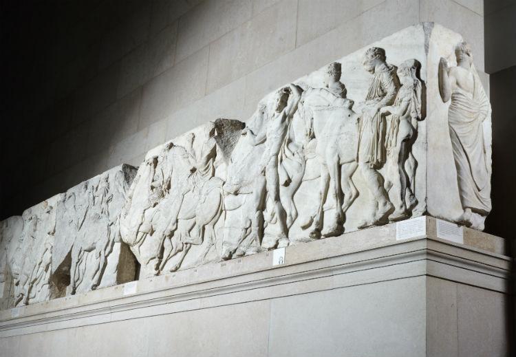 Marble relief showing  a scene of preparation for the cavalcade