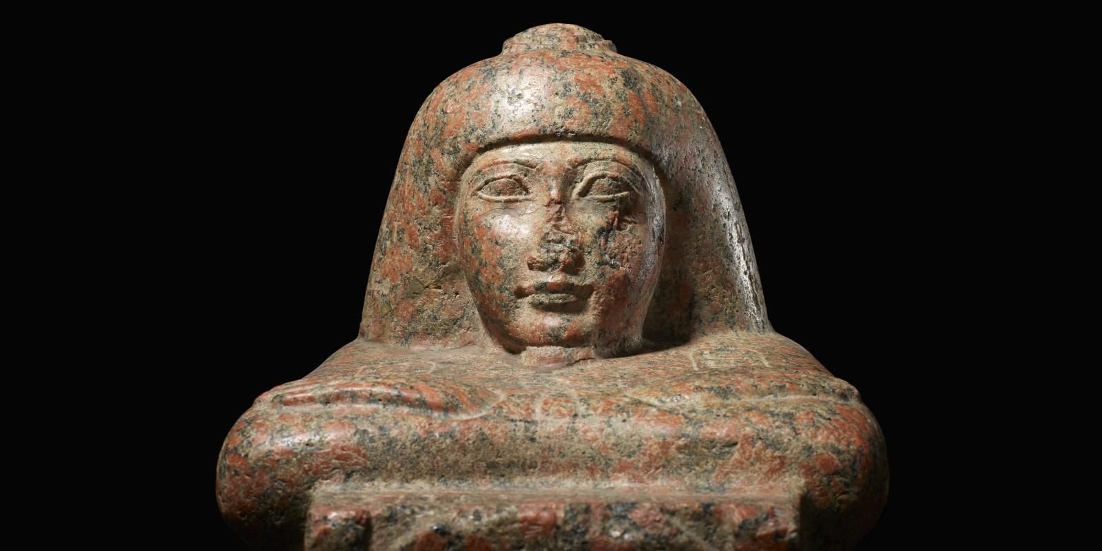 Pink granite naophorous block-statue of Ankhrenepnefer 