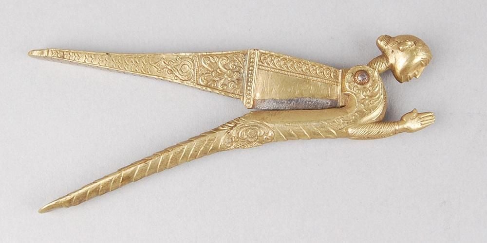 Brass betel-nut cutter in the shape of a woman