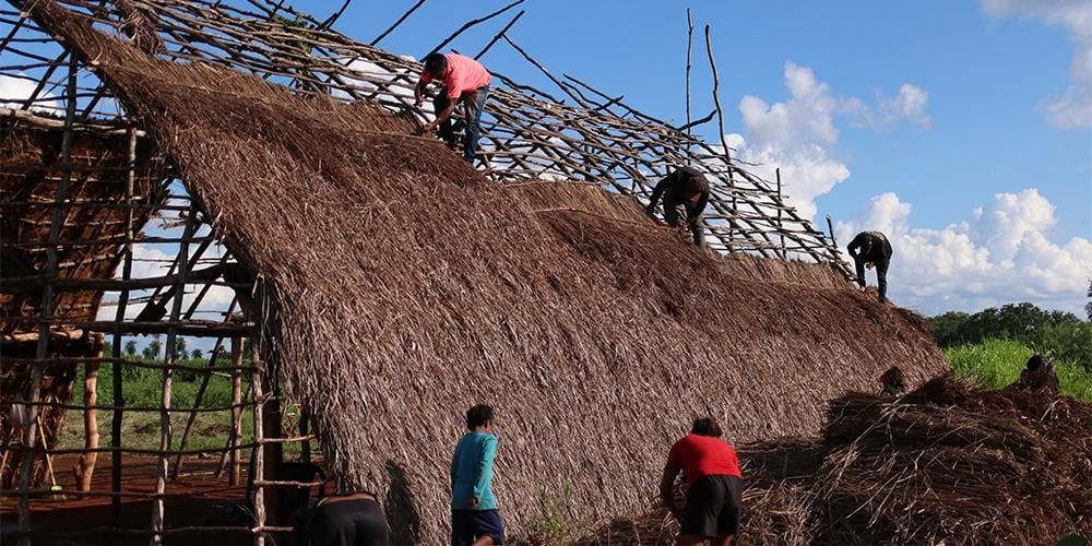 six people building a new house.