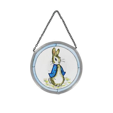 Profile of Peter Rabbit on a roundel.