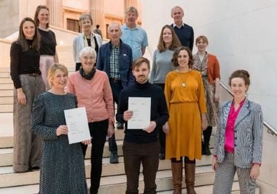 Interpretation Team from the Cleveland Pools Trust standing on steps. 