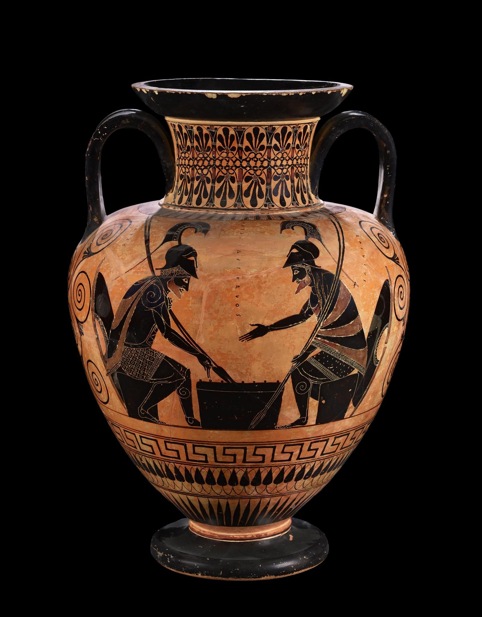 Amphora showing two men seated either side of game wearing helmets