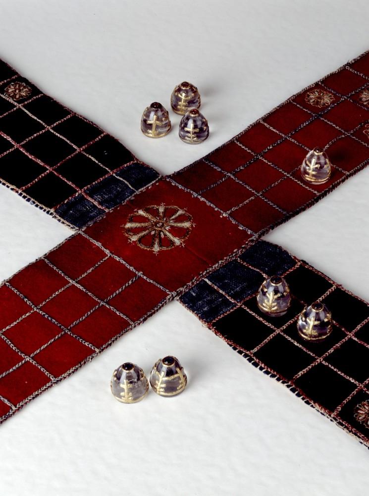 Cross-shaped game board, made of cotton and velvet, with embroidery and game pieces