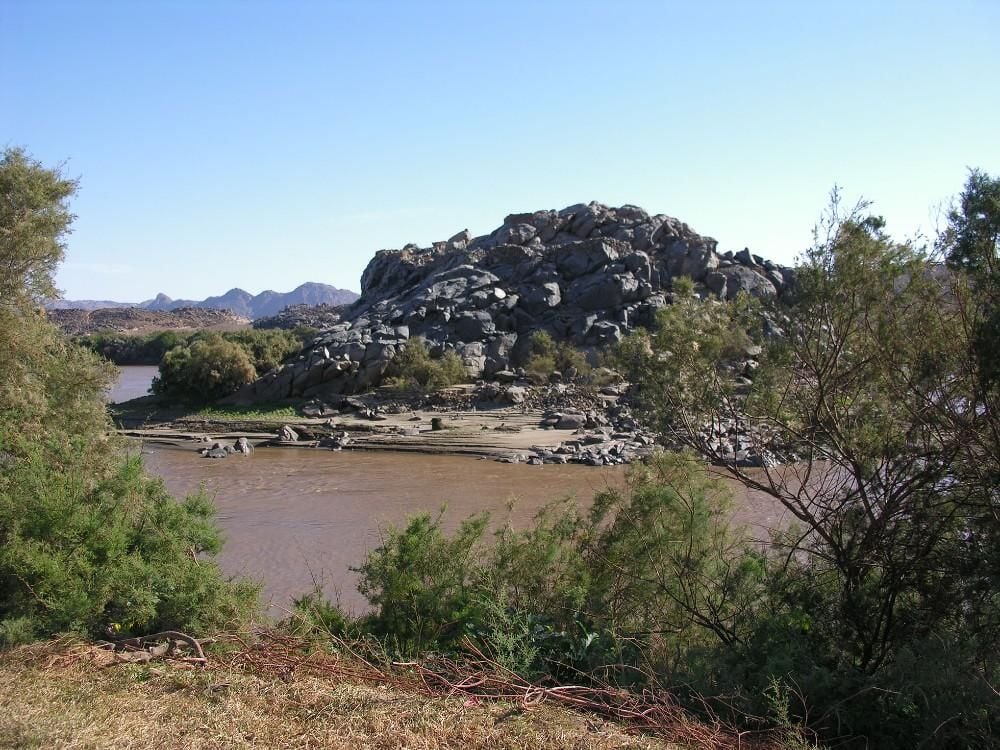 Photograph of Kulubnarti with river, trees and shrubs