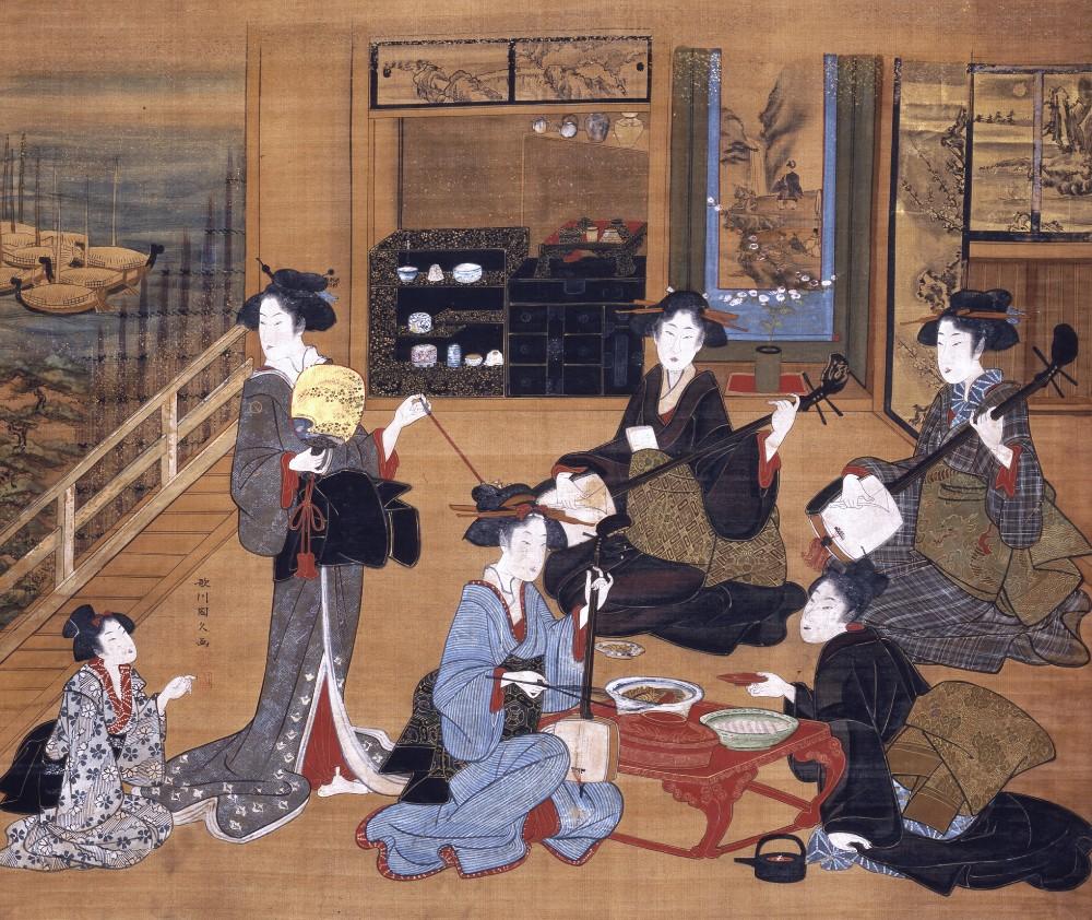 Group of geishas and young attendant playing musical instruments
