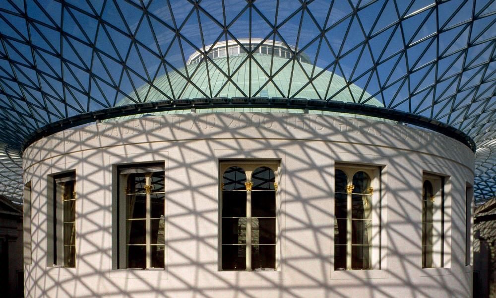 Close-up view of the external walls of the Round Reading Room with glass roof above. 