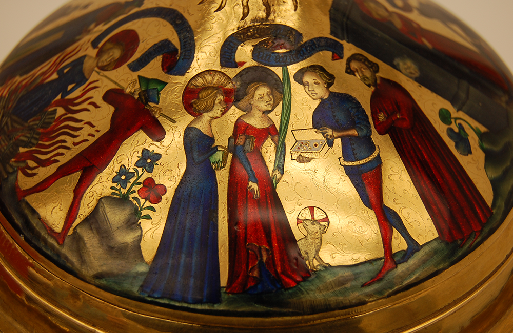 Detail of gold cup with enamelled figures wearing jewel-like reds and blues
