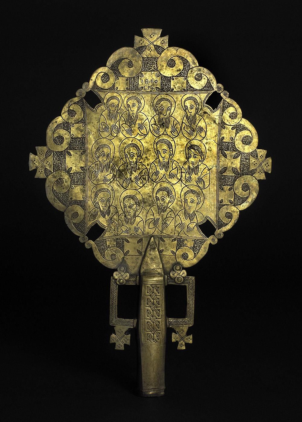 Inscribed cross made of bronze.