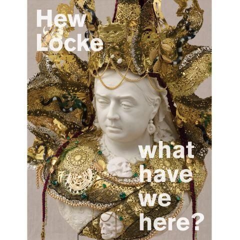 The front cover of the book Hew Locke: what have we here? with an adorned sculpture of Queen Victoria