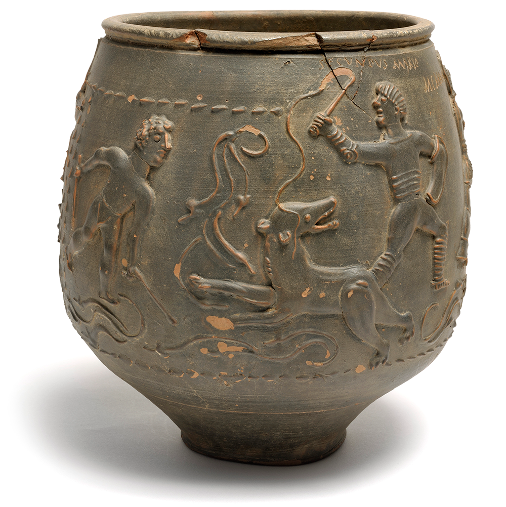 Scene carved into the terracotta Colchester Vase of two gladiators baiting a bear