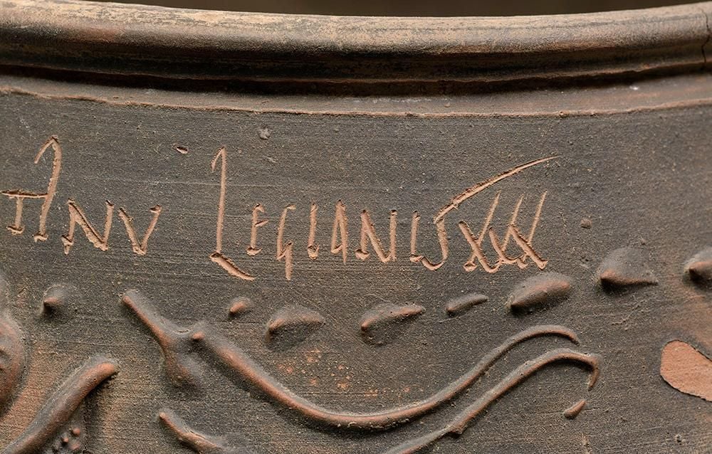 Inscription of the words Legionis XXX carved into the terracotta of the Colchester vase
