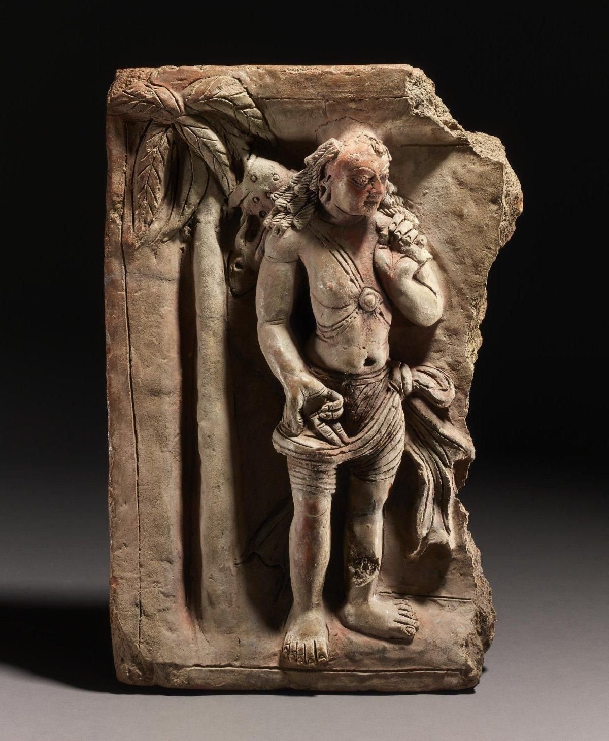 Terracotta carving depicting Shiva as a hunter