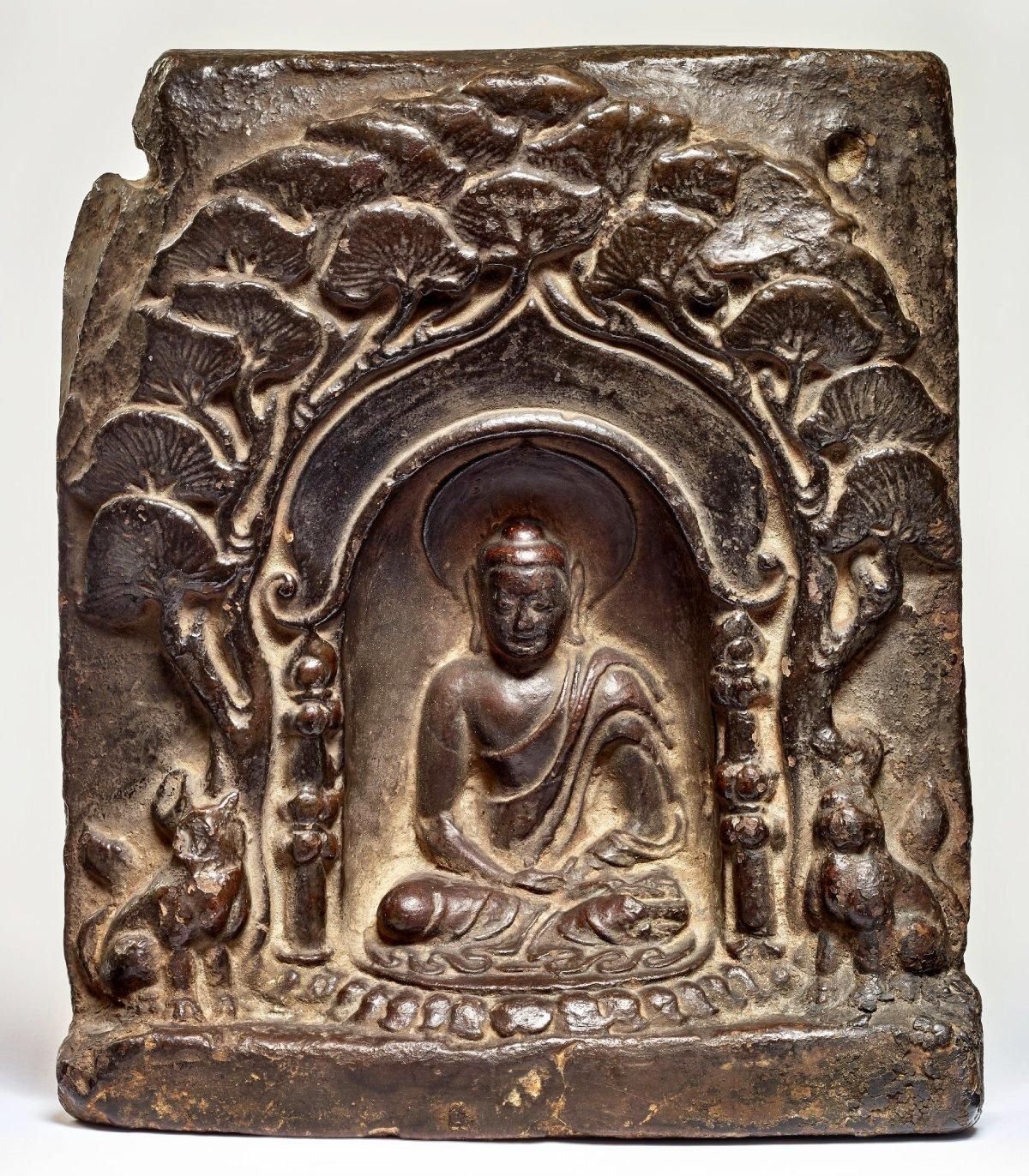 Earthenware plaque carving depicting the Buddha