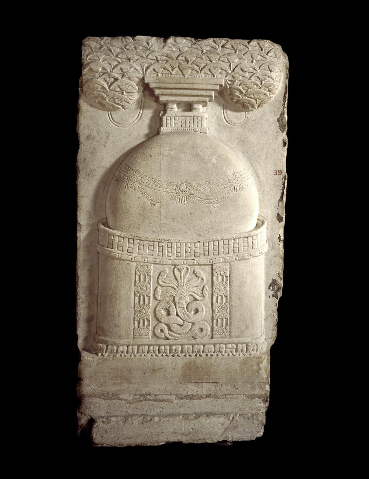 Limestone drum-slab ('Palnad marble') with a stupa