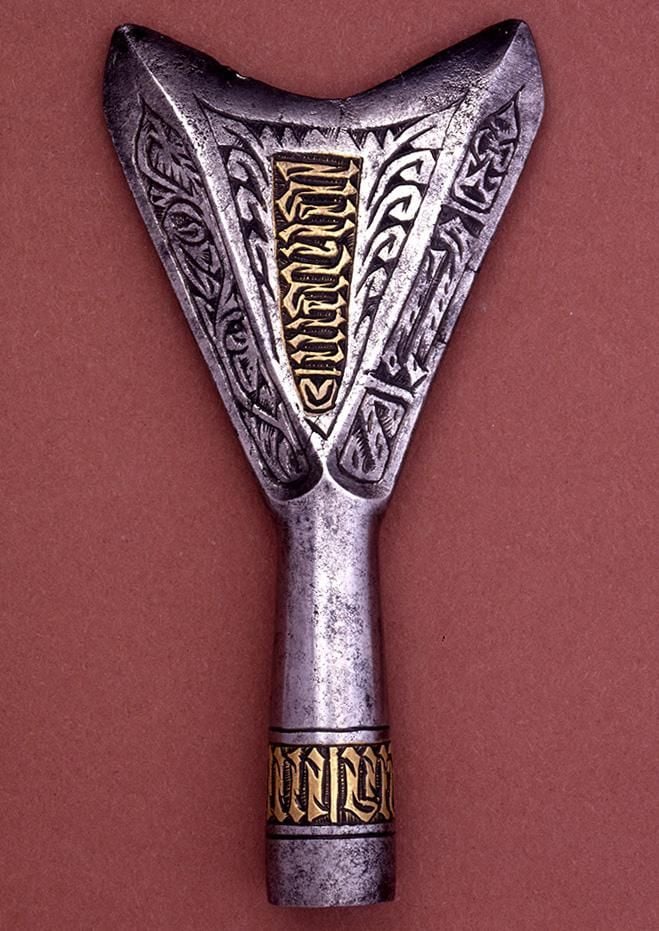 Silver crossbow bolt with gold and silver detail 