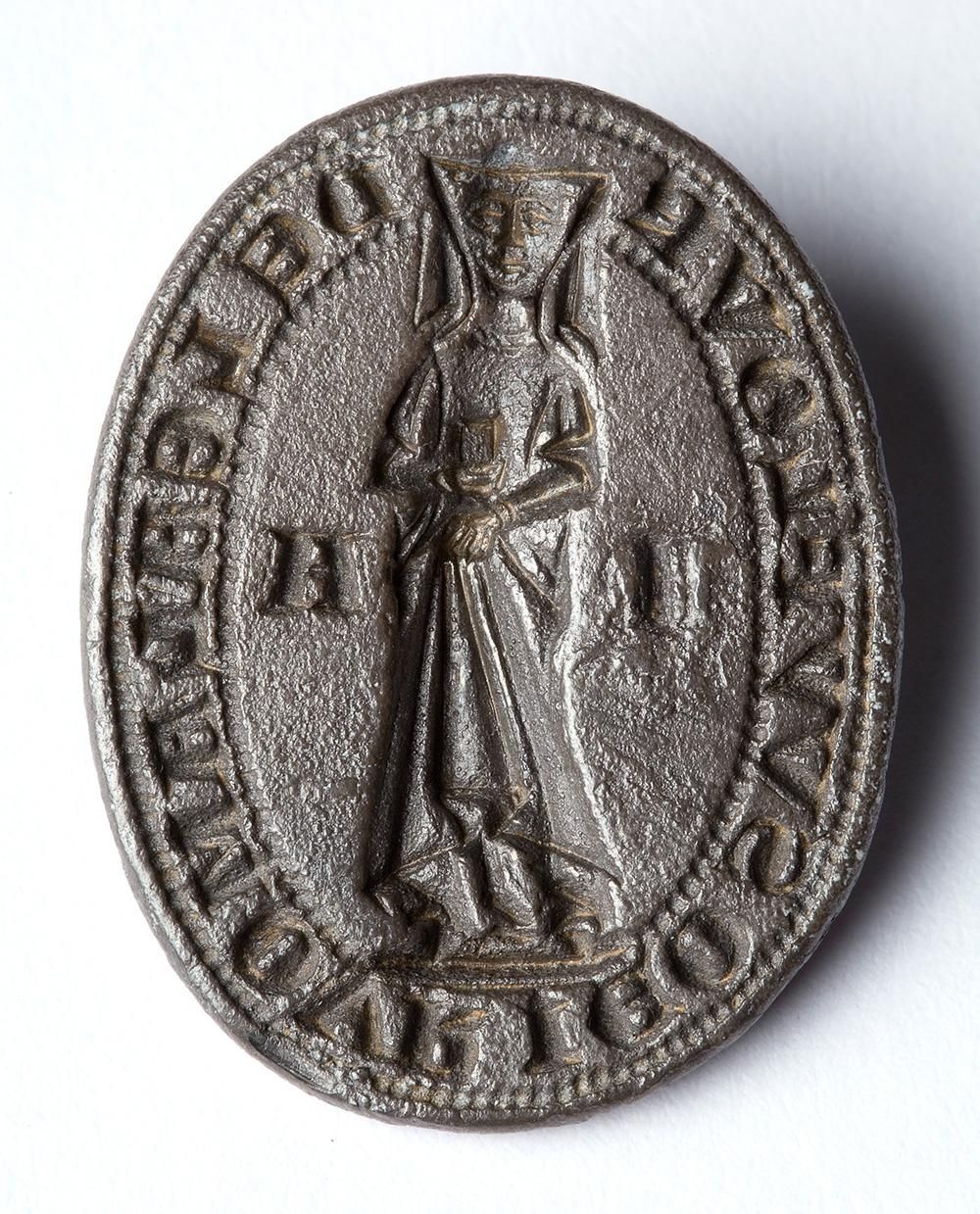 Silver seal with engraving of a woman, the initials A and I, and around the edge: I am the flower of true love