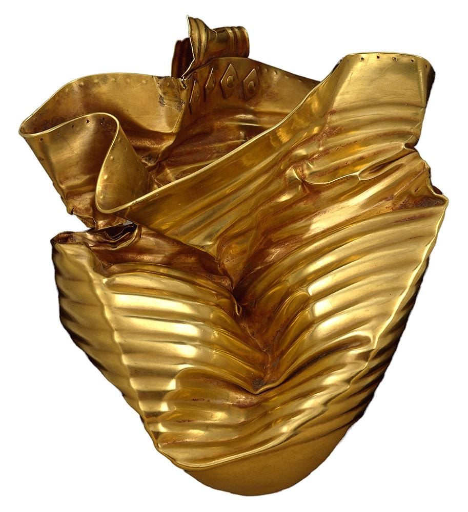 Gold goblet with corrugated sides and a conical shape