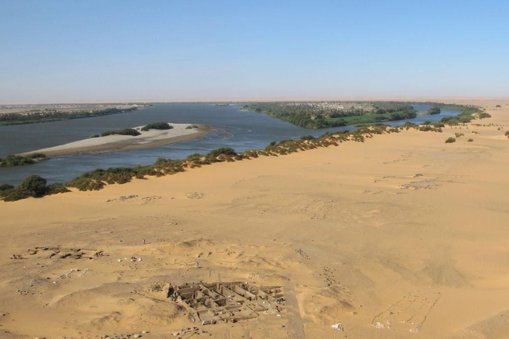 View from above, ancient town remains, dessert and body of water